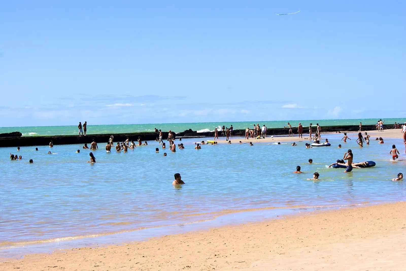 Natural reef breakwater along Boa Viagem beach in Recife, the rocky formation that gives the city its name