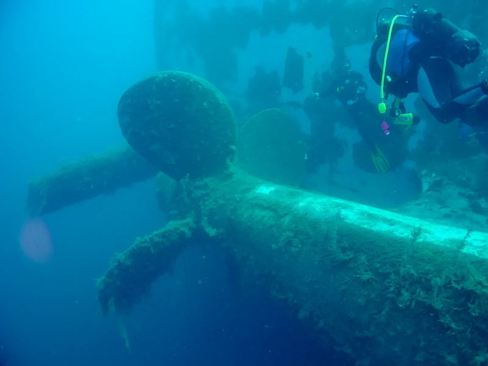 Diver inspecting a propeller at the stern of the Zenobia ferry wreck
