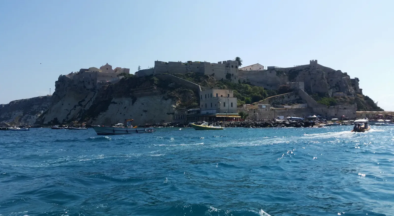 Fortified abbey walls of San Nicola island rising above the sea in the Tremiti archipelago