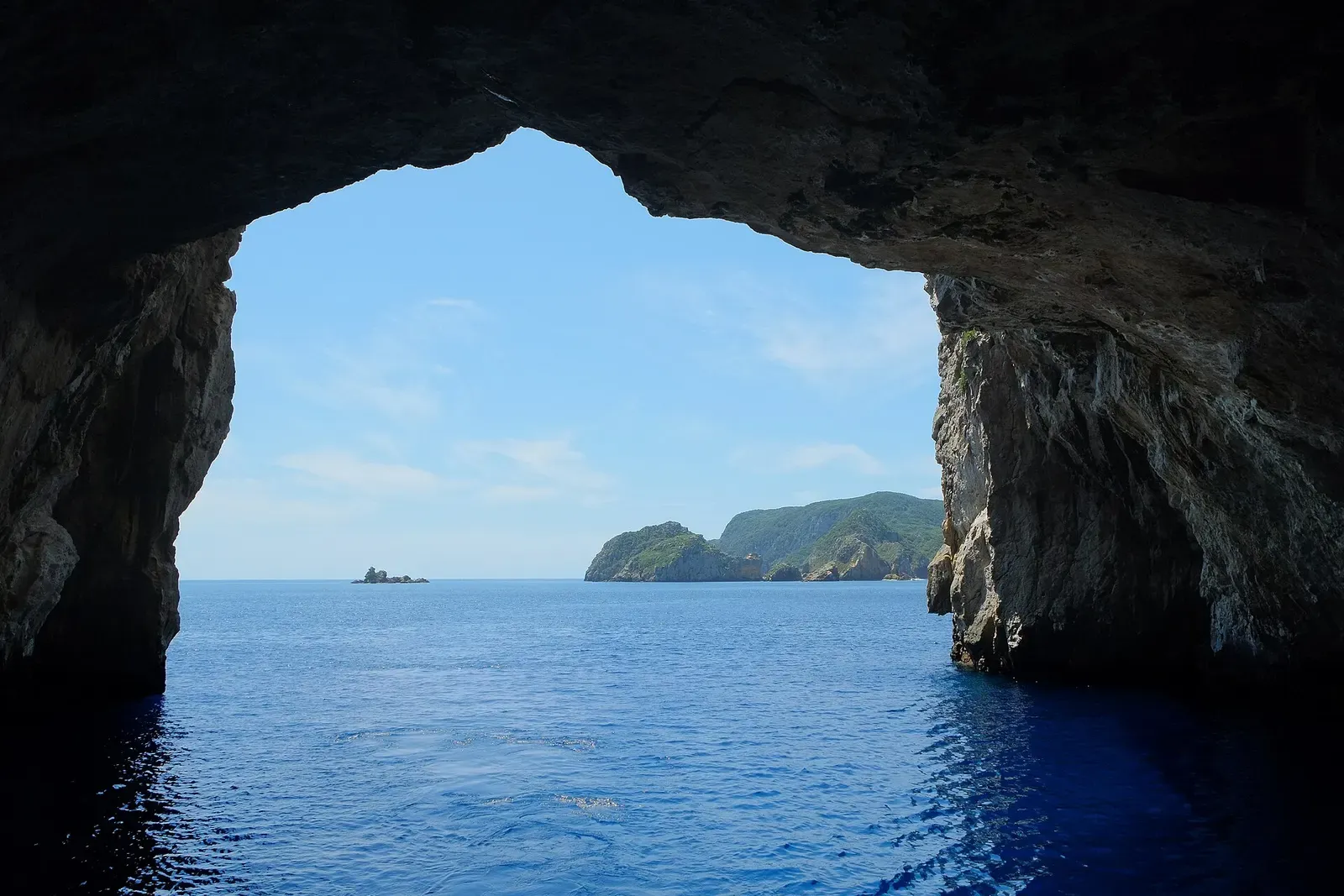 View from inside Rikoriko Cave looking out toward Kaka Rock and Tawhiti Rahi Island.