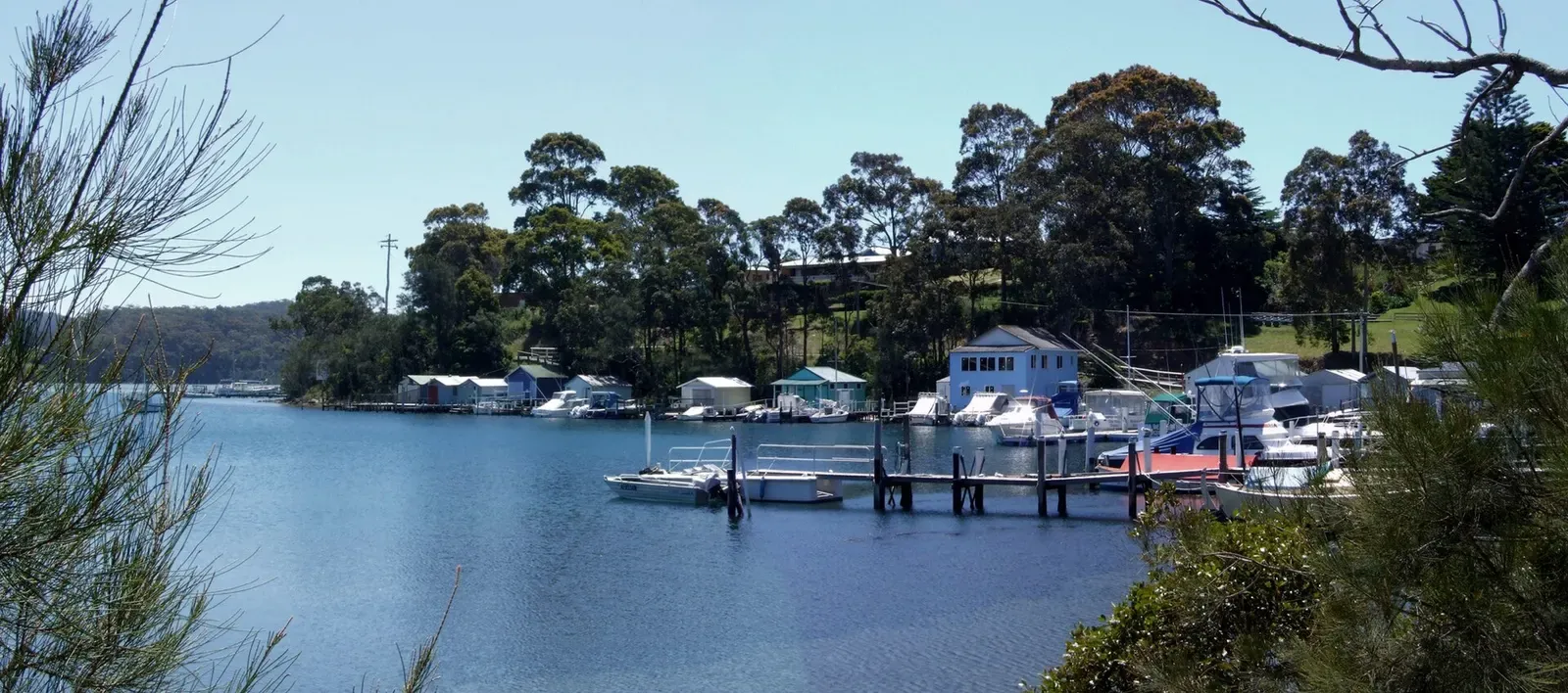 Boats moored at Forsters Bay Marina in Narooma, the mainland town near Montague Island
