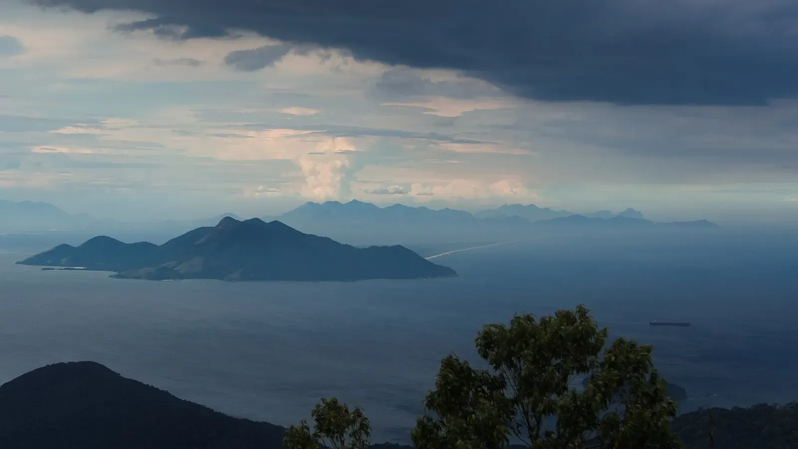 Hazy view over Ilha Grande's bay and its scattered islands from a hilltop