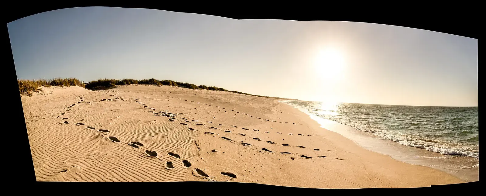 Footprints crossing a sand dune down to the beach at Jansz Beach on North West Cape near Exmouth